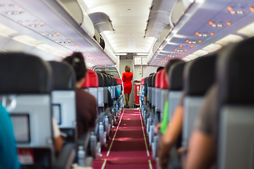 Image showing Stewardess on the airplane.