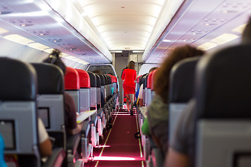 Image showing Stewardess on the airplane.