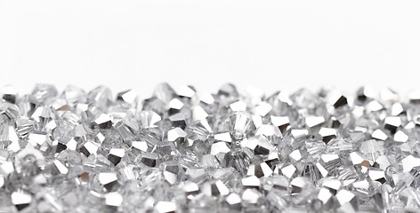 Image showing Beautiful glass beads closeup on white background