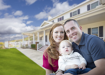 Image showing Young Military Family in Front of Beautiful House