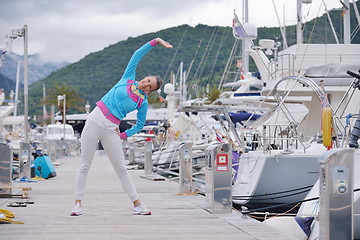 Image showing woman jogging in marina