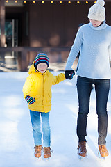 Image showing family ice skating