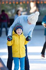 Image showing family ice skating