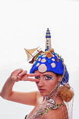 Image showing Woman wearing a nautical themed headdress