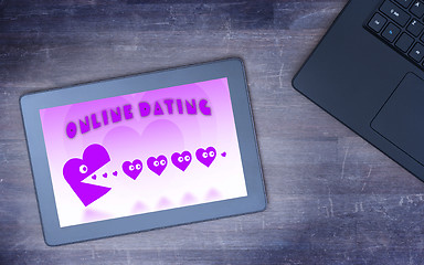 Image showing Online dating on a tablet