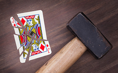 Image showing Hammer with a broken card, jack of diamonds