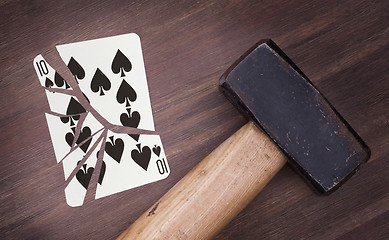 Image showing Hammer with a broken card, ten of spades