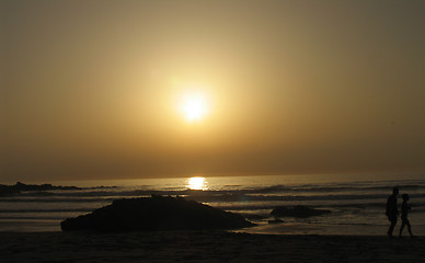 Image showing Walking on a sunset
