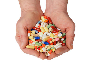 Image showing Hands with pills