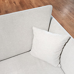 Image showing Elegant gray sofa with cushion