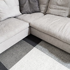 Image showing Gray corner sofa and carpet