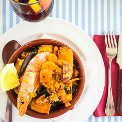 Image showing Seafood dish and sangria