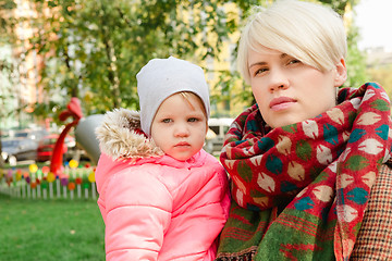 Image showing Beautiful Mother And Baby outdoors.