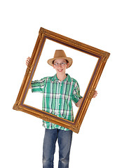 Image showing Boy with picture frame.