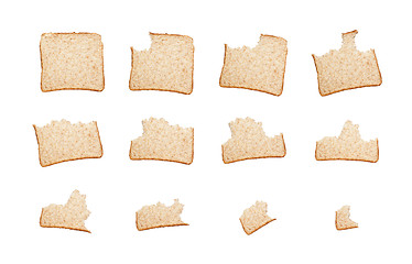 Image showing Eating a slice of wholemeal bread