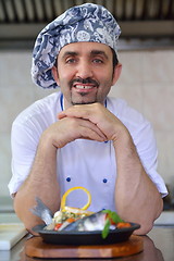 Image showing chef preparing food