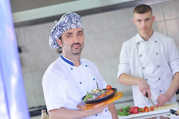 Image showing chef preparing food