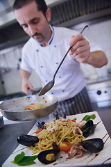 Image showing chef preparing food