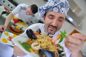 Image showing chef preparing food