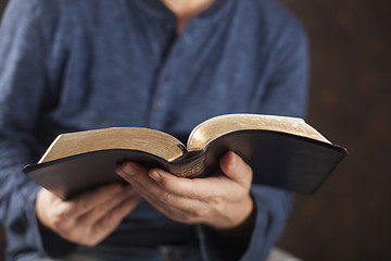 Image showing Man reading the holy bible