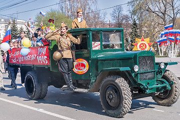 Image showing ZIS-5 truck with soldier and girls on parade