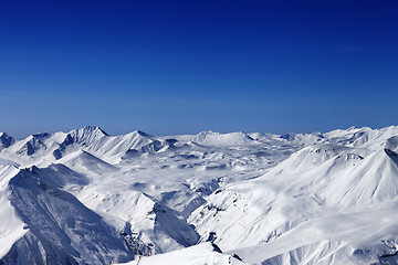 Image showing Snow plateau and blue clear sky