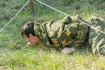 Image showing Boy participates in militarized relay