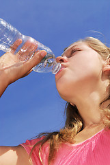 Image showing Girl drinking water