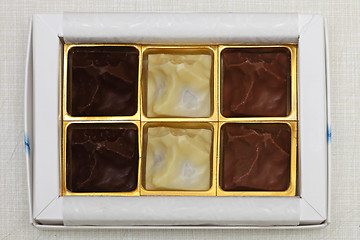 Image showing Three chocolates