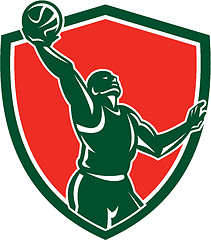 Image showing Basketball Player Rebounding Lay-Up Ball Shield