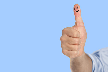Image showing Thumb up with a smile