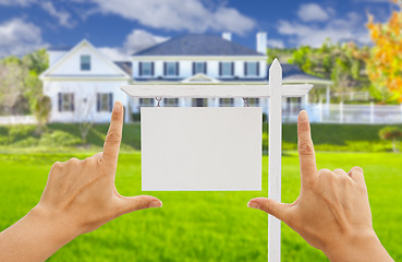 Image showing Hands Framing Blank Real Estate Sign and New House