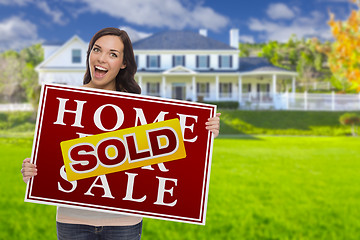 Image showing Mixed Race Female with Sold Sign In Front of House