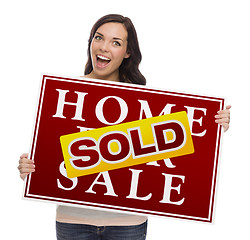 Image showing Mixed Race Female with Sold Home For Sale Sign