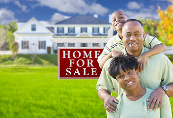 Image showing African American Family In Front of Sale Sign and House