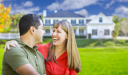 Image showing Happy Mixed Race Couple in Front of House