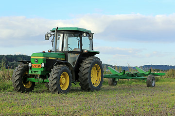 Image showing John Deere 2850 Utility Tractor and Small Trailer