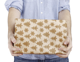 Image showing Young man holding a present