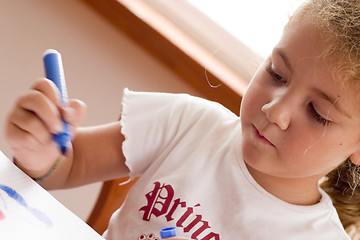 Image showing concentrated schoolgirl