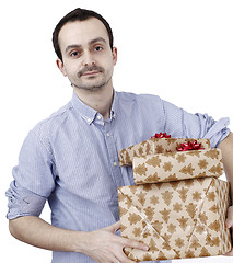 Image showing Young man holding a present