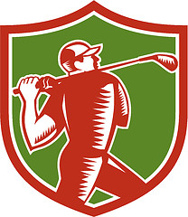 Image showing Golfer Swinging Club Shield Woodcut