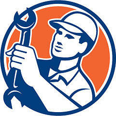 Image showing Mechanic Holding Spanner Wrench Circle Retro