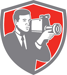 Image showing Video Cameraman Shooting Vintage Shield Retro