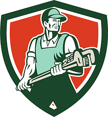 Image showing Plumber Holding Giant Wrench Retro Shield