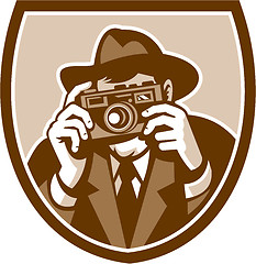 Image showing Photographer Shooting Camera Shield Retro