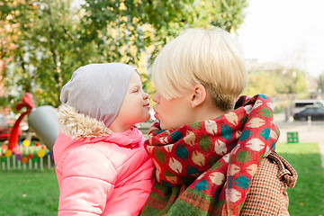 Image showing Beautiful Mother And Baby outdoors.