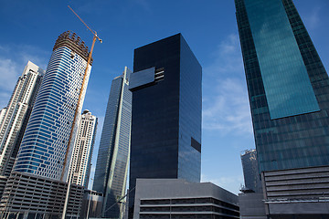 Image showing high luxury modern building skyscraper, crane