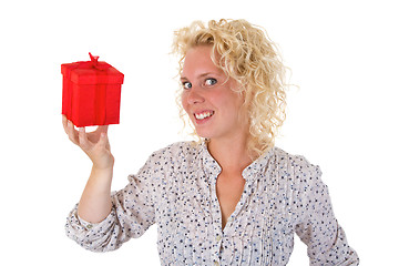 Image showing Young woman showing a gift