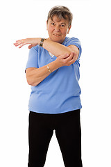 Image showing Senior woman doing exercises