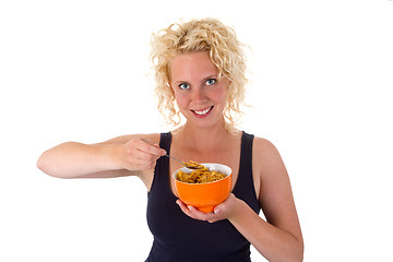 Image showing Young woman with cornflakes